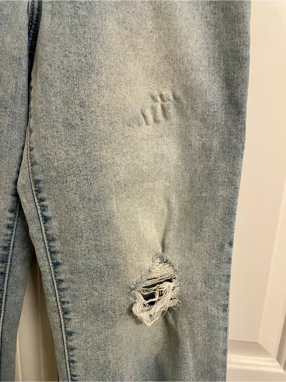 Levi's High-Rise Light Blue Distressed Straight Jeans